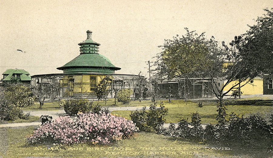 A small park consisting of landscaped grounds, a zoo and this round aviary were built to the west of the ice cream parlor. Together they served as the first version of the House of David's soon-to-be famous amusement park. The aviary was later used as the leather cobbler shop. The structure behind the aviary on the left is the first of many log cabins that would grace the House of David grounds.