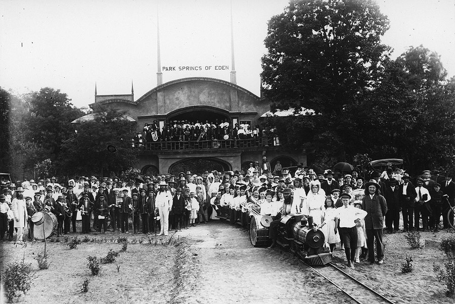 Eden Springs Park opened for the 1908 season. Here Brother Benjamin and many of the faithful gather along with non-members to celebrate the park's grand opening. The Archway stands behind them.