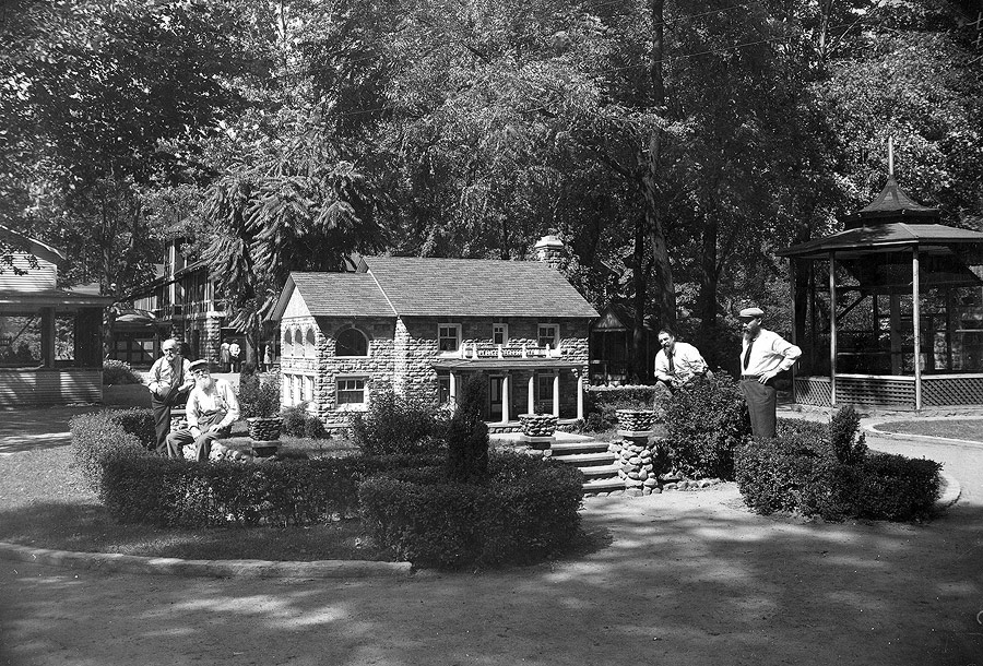The center of Eden Spring's zoo was the home of two famous miniature houses. The first was a wooden model. It was later replaced by this handsome stone house built by John Herron. Herron did much of the elaborate stonework found throughout the park as well as other House of David properties.