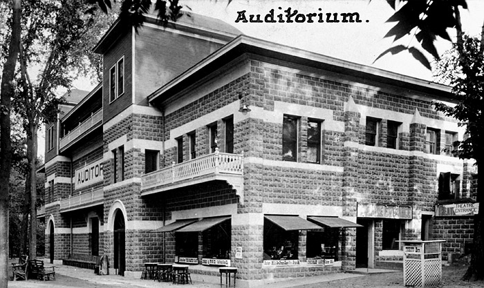 This picture is the Auditorium that was where the relatively new foundation surrounding the beds of flowers and trees are now.  The building was used for preaching during the park season.  Before the roof was in place, we had long strips of shading for the people.  In the early days, motion pictures were shown here and Nick Carealis would make candy in the basement.  Nick would often open the windows and as the smell of the fresh made treats would drift over the crowds, this was a great sales draw.