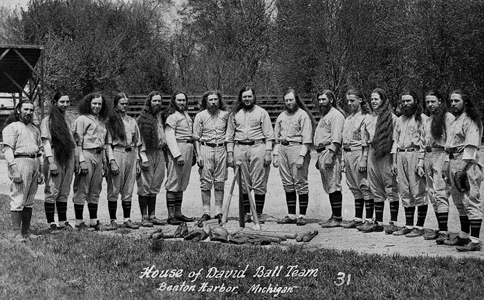 After the colony split in 1930, there would be teams from both colonies carrying on the House of David Baseball tradition.  Here we have a photo of our "home" team taken at the colony park in 1930.  The colony members from left: John Nimitz, Earl Boyersmith, Sidney Smith, Jack Crow, JB Boone, Oscar Wade, Jack Herron, Tom Dewhirst, Bob Dewhirst, Frank Wyland, Ernie Selby, Leo Wiltbank, Millard Wilson, Hobie Nelson, and Mud Williams.  This was more of a photo to be used for advertising or sold as postcards.  Some of the members such as Nimitz, Wade, Herron and Wilson did not play ball for our team.  We just needed a few more bodies to fill out the uniforms!!!!!