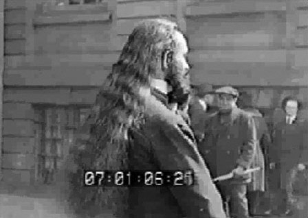 Band member Frank Rossetta, shows the biggest novelty of the House of David Band - long hair and beards.  From 1910 through the 1920s when the road bands were active, the popular style for the rest of the US population, was short hair and shaved faces.