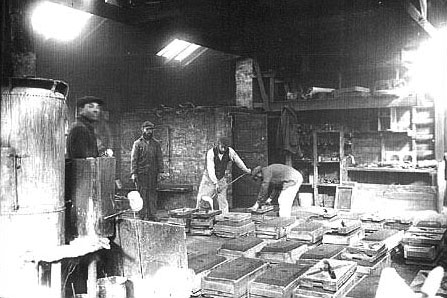 In the early years the House of David operated a foundry.  Here they cast many different articles used at the colony including parts for the miniature trains.  Along with articles such as stove parts and manhole covers the colonists cast parts for the trains including fire box grates, cylinders, pistons, wheels and smoke box rings.  The man at the far left in this foundry picture is John Tucker the famous House of David baseball player.  In this egalitarian society even well known members worked at less glamorous jobs for the good of all.  Industry was encouraged and during seasonal work peaks on the farms colony sports figures, musicians and leaders could be found side by side with the rank a file members in the fields.